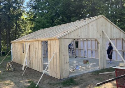 Gray Amish Built Garage with White Trim